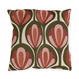 Modern retro outdoor pillow with seventies rust and pink tulips in olive green pods on cream