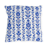 Cobalt blue folk tulip stripes on a white outdoor pillow