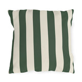 Forest green and cream cabana stripes on an outdoor pillow