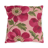 Floral outdoor pillow with large painted raspberry pink anemones and olive green leaves on blush