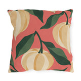 Fall outdoor pillow with cream and golden Chinese lantern pods and dark green leaves on coral pink