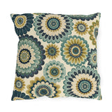 Oversized folk flower outdoor pillow in teal, navy and ochre on cream