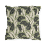 Navy and cream fern fronds on sage green outdoor pillow