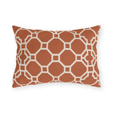 Terracotta Moroccan trellis outdoor lumbar pillow with a cream octagon lattice