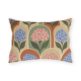 Retro hydrangea outdoor lumbar pillow with blue and pink hydrangeas inside terracotta, sage and cream arches