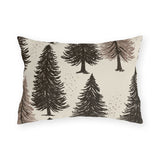 Large ink-sketched pine trees on a cream outdoor lumbar pillow