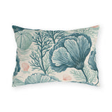 Teal sea fans, kelp and urchins with coral shells on a cream outdoor lumbar pillow