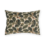 Deep green oak leaves and acorns on cream outdoor lumbar pillow