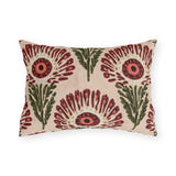 Block print floral outdoor lumbar pillow with wine red fan flowers, coral centers and olive leaves on blush