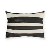 Wide black brushed stripes on a cream outdoor lumbar pillow