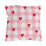 Light pink gingham outdoor pillow with small red hearts