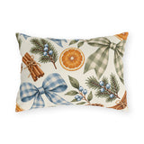 Christmas outdoor lumbar pillow with watercolor blue and sage gingham bows, dried orange slices, cinnamon sticks, pinecones and pine on cream