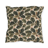 Deep green oak leaves and acorns on cream outdoor pillow