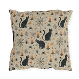 Black cats, lit candles and spiderwebs on oatmeal cream outdoor pillow