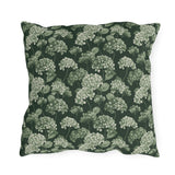 Sage and cream hydrangeas on dark forest green outdoor pillow