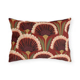 Modern outdoor lumbar pillow with art deco fan flowers in burgundy, cream and coral with green leaves on brick red