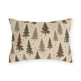 Pine trees in brown, olive and taupe on a speckled cream outdoor lumbar pillow