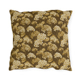 Gold and cream hydrangeas on chocolate brown outdoor pillow