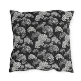 White and grey hydrangeas on black outdoor pillow