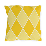 Yellow harlequin diamond outdoor pillow with sunny and butter yellow diamonds and white lines