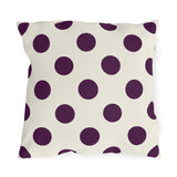 Aubergine polka dot outdoor pillow with large deep purple dots on cream
