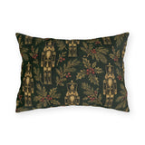 Gold and green Christmas nutcracker outdoor lumbar pillow with gold nutcrackers, holly and pine on forest green