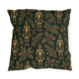 Gold and green Christmas nutcracker outdoor pillow with gold nutcrackers, holly and pine on forest green