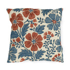Block print floral outdoor pillow with brick red and denim blue flowers and leaves on cream