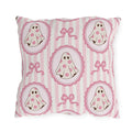 Pink cartoon ghosts in scalloped frames with bows on pink stripe outdoor pillow