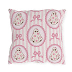 Pink cartoon ghosts in scalloped frames with bows on pink stripe outdoor pillow