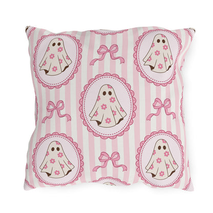 Pink cartoon ghosts in scalloped frames with bows on pink stripe outdoor pillow