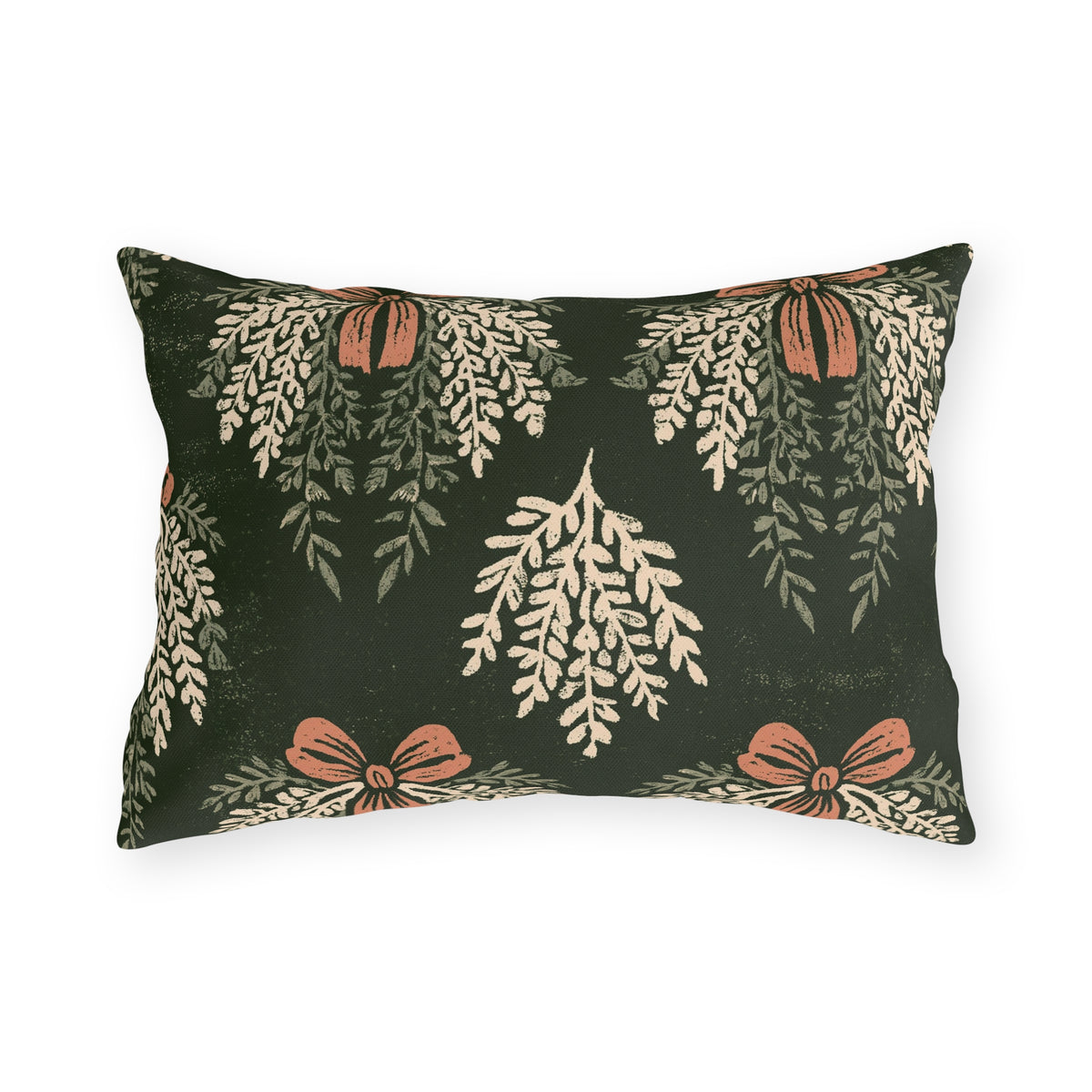 Cream cedar fronds and terracotta bows on a near-black forest green outdoor lumbar pillow