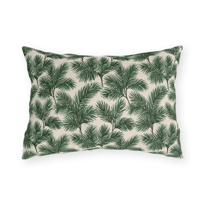 Deep green pine and fir branches on cream outdoor lumbar pillow