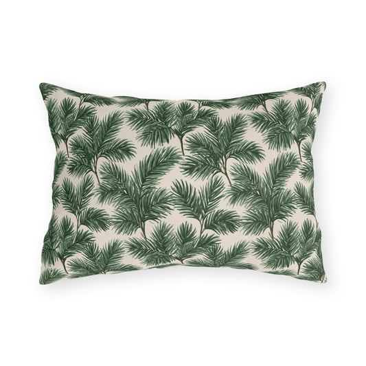 Deep green pine and fir branches on cream outdoor lumbar pillow
