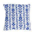 Cobalt blue folk tulip stripes on a white outdoor pillow