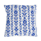 Cobalt blue folk tulip stripes on a white outdoor pillow