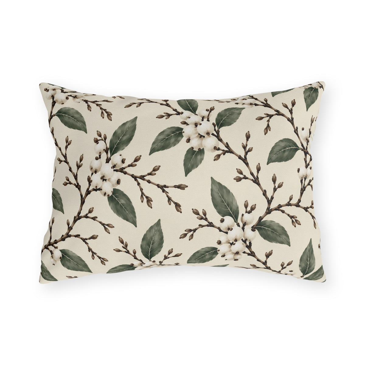 White snowberries on brown branches with green leaves on a cream outdoor lumbar pillow