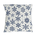 Snowflake outdoor pillow with navy blue snowflakes and small dots on crisp off-white