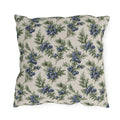 Blue juniper berries and green foliage on cream outdoor pillow