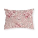 Pink poinsettias, snowflakes and pearls on dusty rose outdoor lumbar pillow