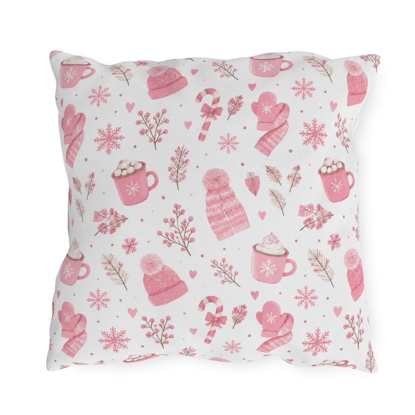 Pink beanies, mittens, cocoa mugs and snowflakes on white outdoor pillow