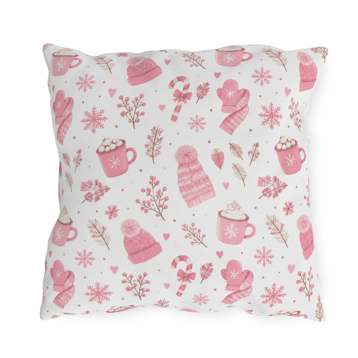 Pink beanies, mittens, cocoa mugs and snowflakes on white outdoor pillow