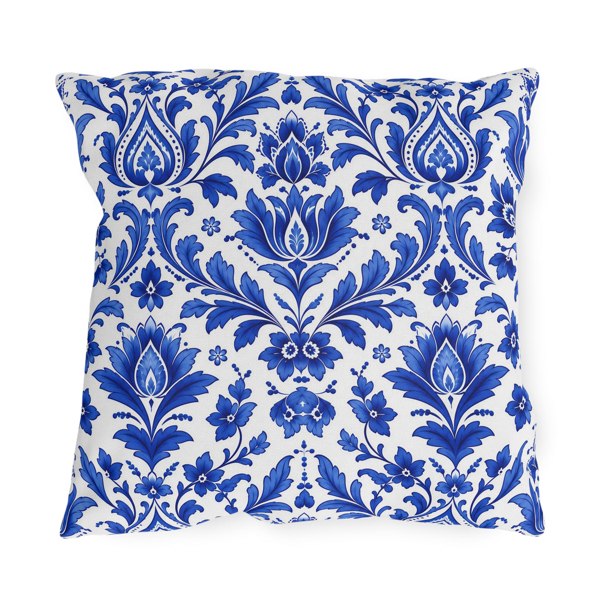 Cobalt blue delft damask pattern on a white outdoor pillow