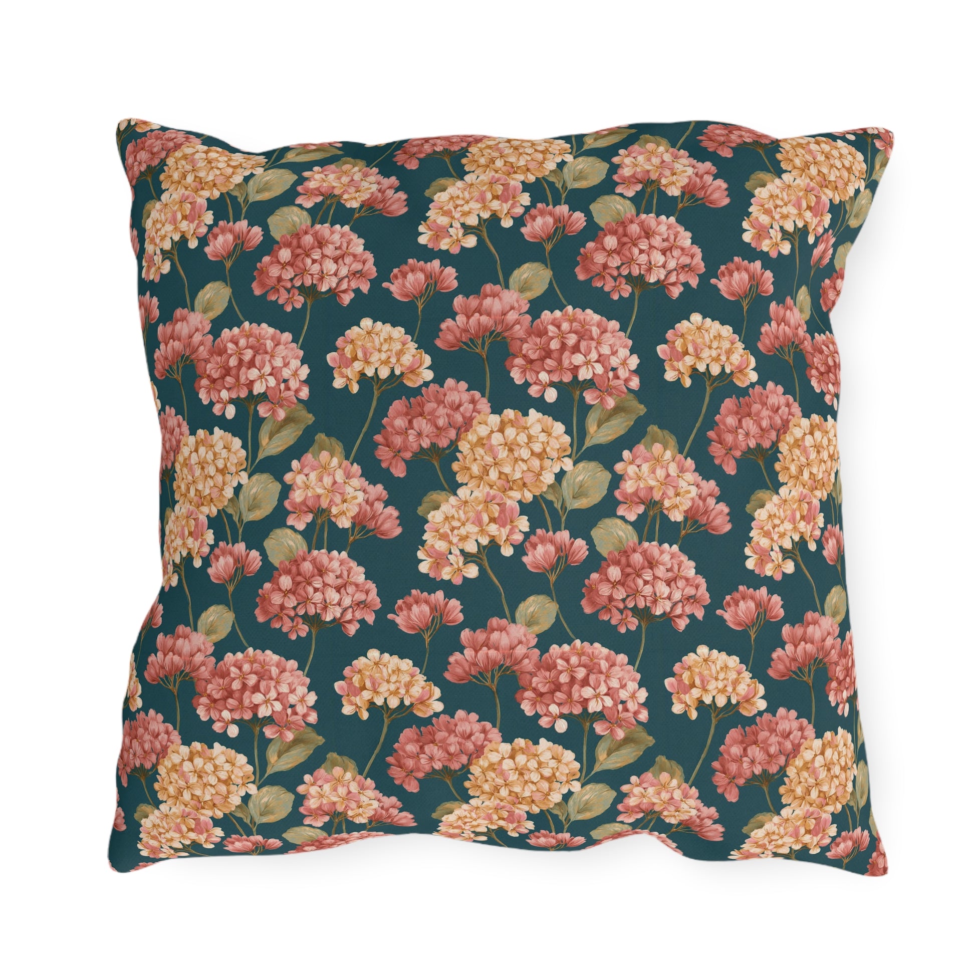 Pink and cream hydrangeas on deep teal outdoor pillow