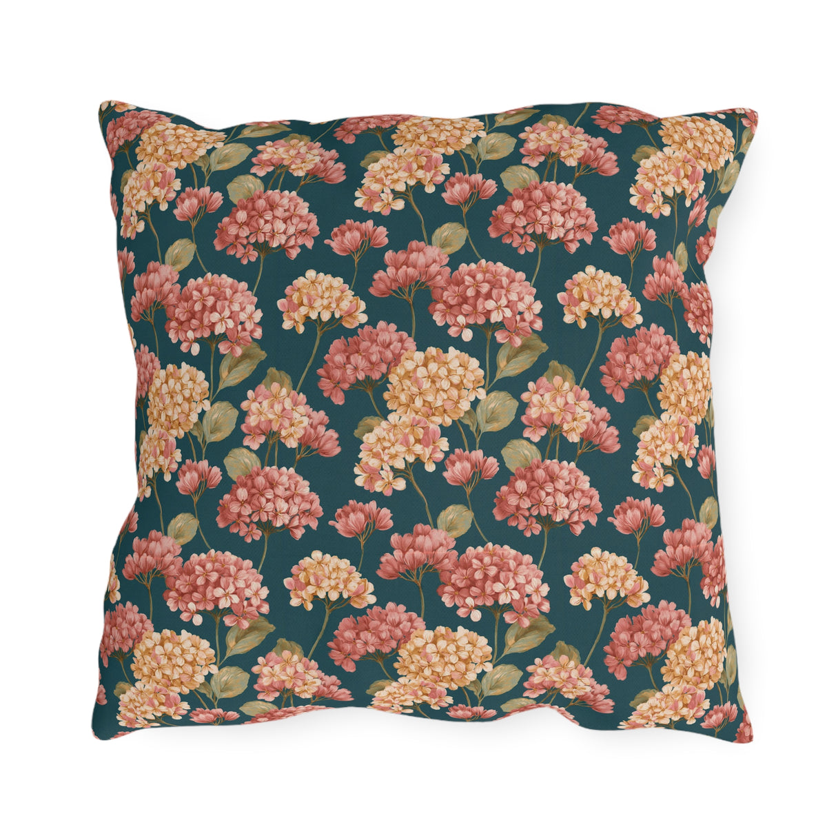 Pink and cream hydrangeas on deep teal outdoor pillow