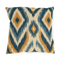 Boho outdoor pillow with an ikat diamond pattern in navy, slate blue and mustard on cream