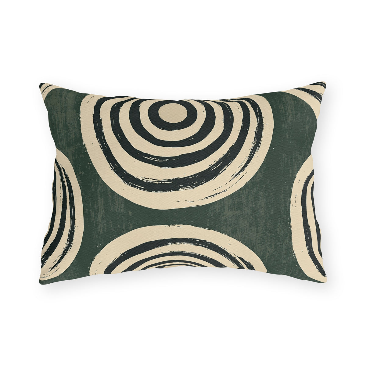 Black and cream concentric rings on a mottled forest green outdoor lumbar pillow
