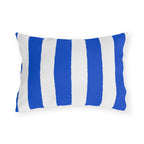 Blue and white awning stripe outdoor lumbar pillow with wide royal blue stripes on white