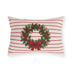 Christmas wreath outdoor lumbar pillow with a pine and berry wreath and red bow on cream with cranberry pinstripes