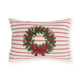 Christmas wreath outdoor lumbar pillow with a pine and berry wreath and red bow on cream with cranberry pinstripes